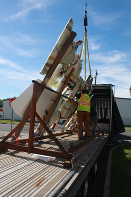 Rigging to lift the sculpture from the truck