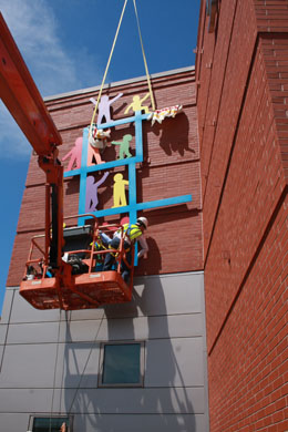 Bolting the sculpture to the brackets