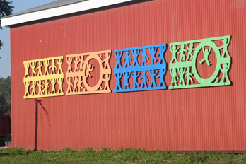 Childhood Rhythms on a barn